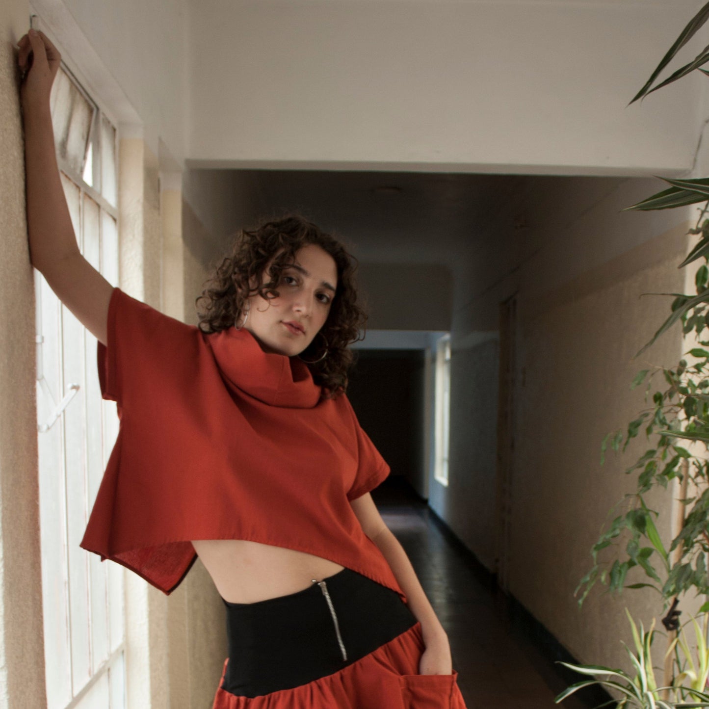 Top Existencia corto